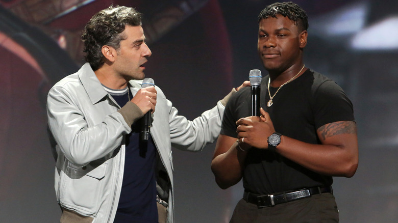 John Boyega and Oscar Isaac onstage