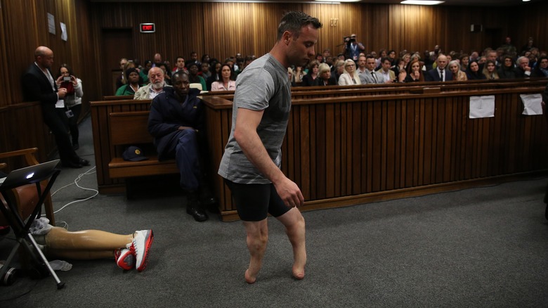 Oscar Pistorius walking in court without his prosthetics