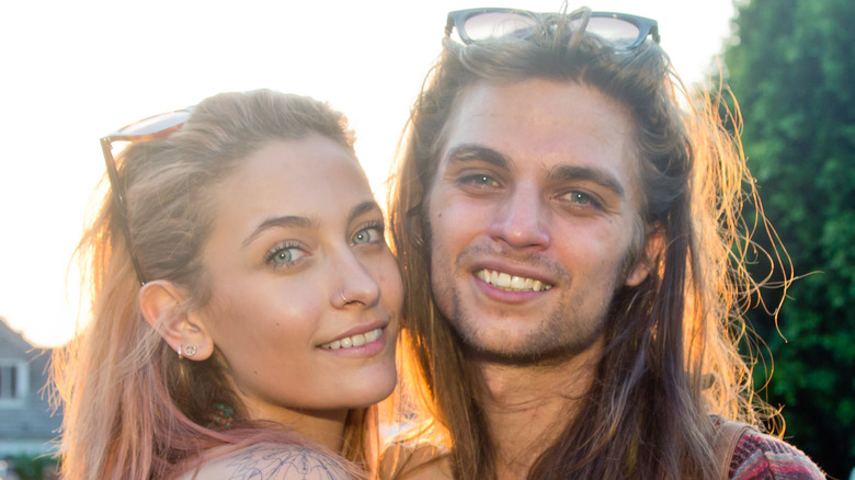 Paris Jackson and Gabriel Glenn smiling at camera