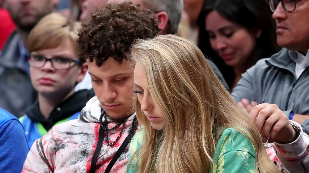 Patrick Mahomes and Brittany Matthews sitting together