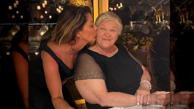 Randi Mahomes kisses mother Debbie Martin