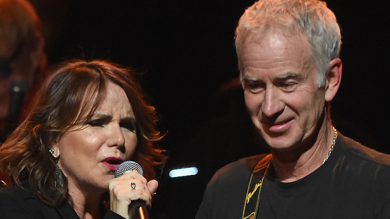 Patty Smyth and John McEnroe performing