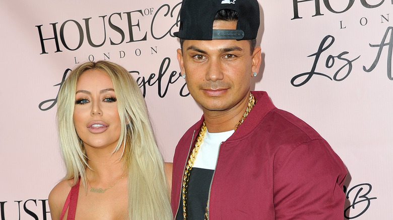 inger Aubrey O'Day (L) and DJ Pauly D attend the House of CB Flagship Store Launch party at the House of CB 