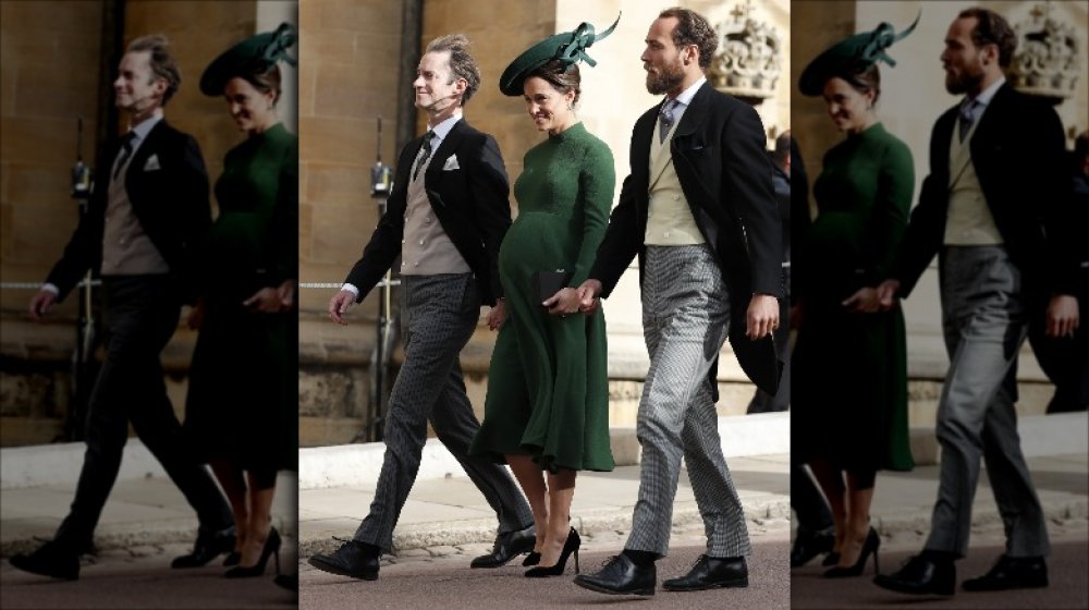 James Matthews, a pregnant Pippa Middleton, and James Middleton walking together