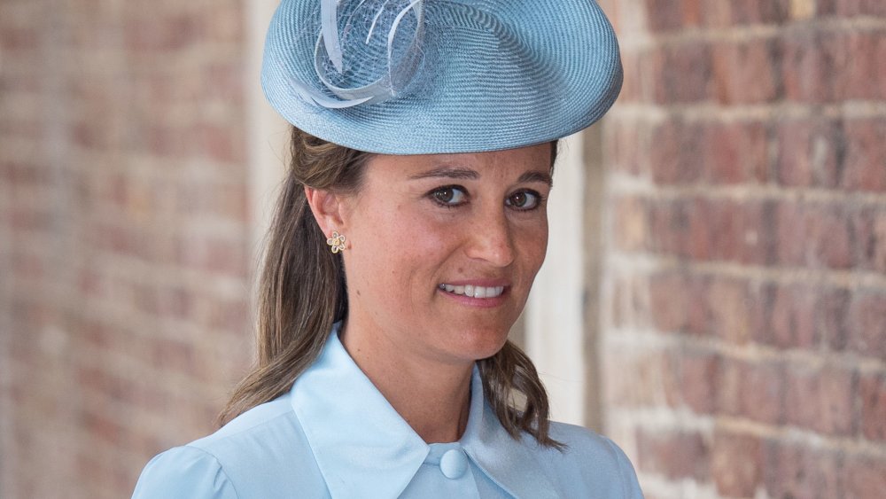 Pippa Middleton glancing at camera with a hesitant smile