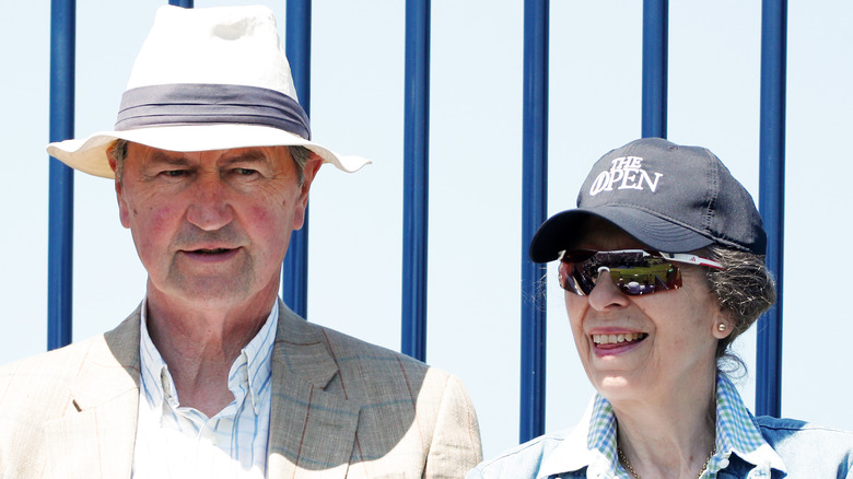 Princess Anne and Sir Timothy Laurence at golf 