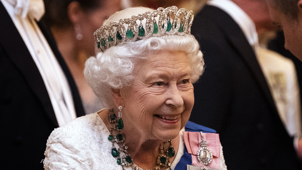 Queen Elizabeth smiles during a public appearance