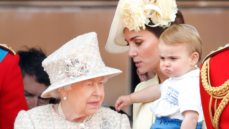 Queen Elizabeth, Kate Middleton, and Prince Louis