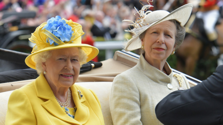 Princess Anne and Queen Elizabeth riding in a car togehter