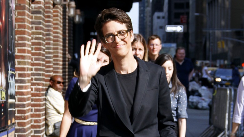 Rachel Maddow waving