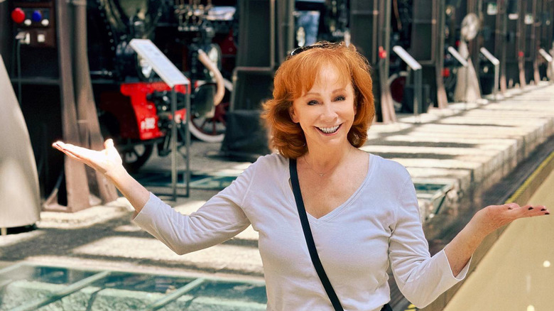 Reba McEntire white tee shirt smiling