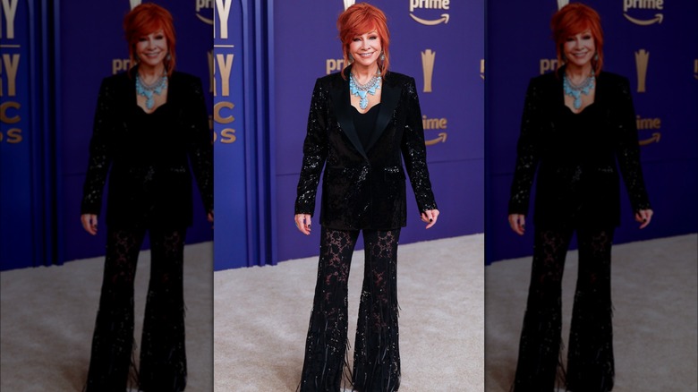 Reba McEntire black blazer sheer lacy pants