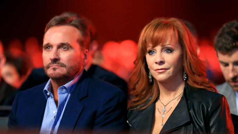 Narvel Blackstock and Reba McEntire attending awards show