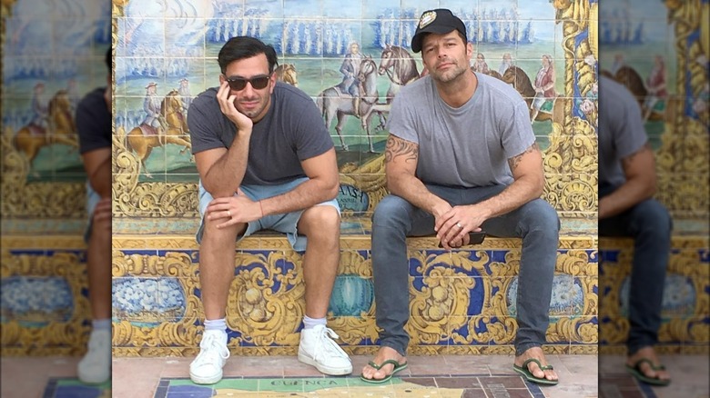 Jwan Yosef and Ricky Martin sitting