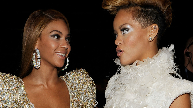 Rihanna and Beyoncé posing 