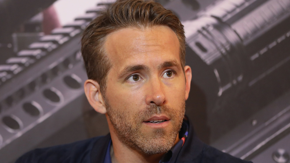 Ryan Reynolds smirking