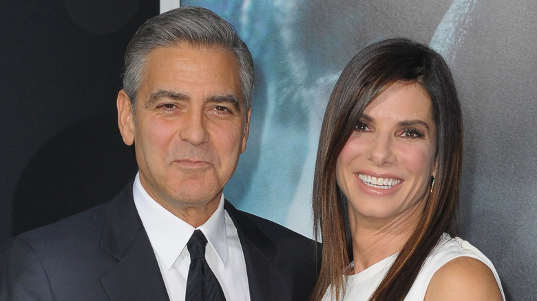 Sandra Bullock and George Clooney smiling