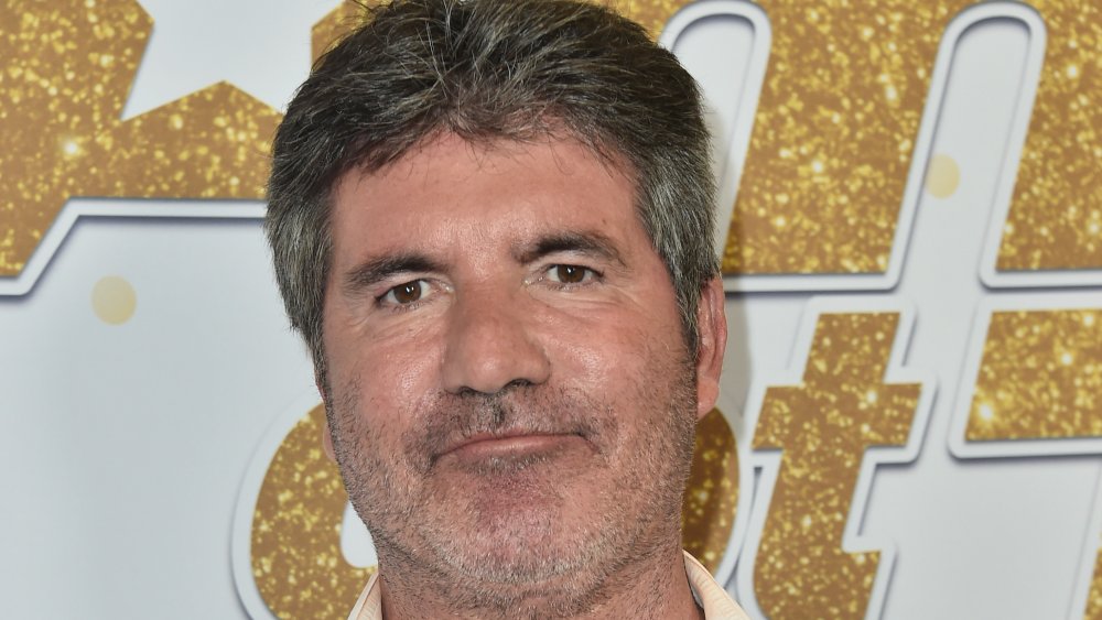 Judge Simon Cowell arrives for the "America's Got Talent" Season 13 Live Show at Dolby Theatre