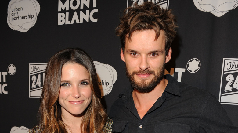 Sophia Bush and Austin Nichols smiling