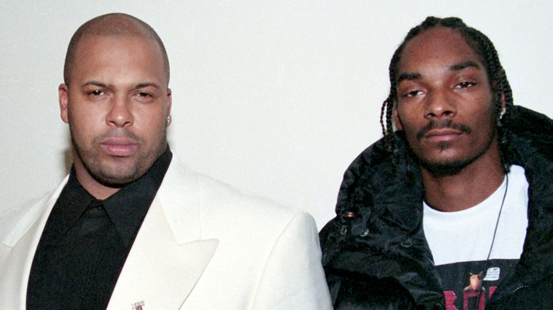 Suge Knight and Snoop Dogg staring