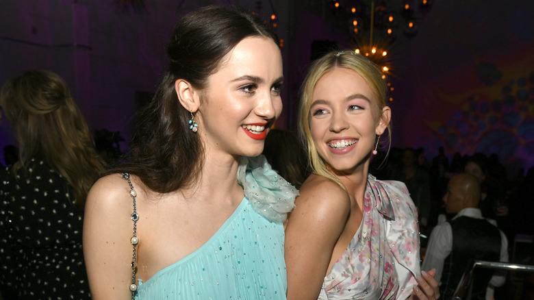 Maude Apatow and Sydney Sweeney smiling