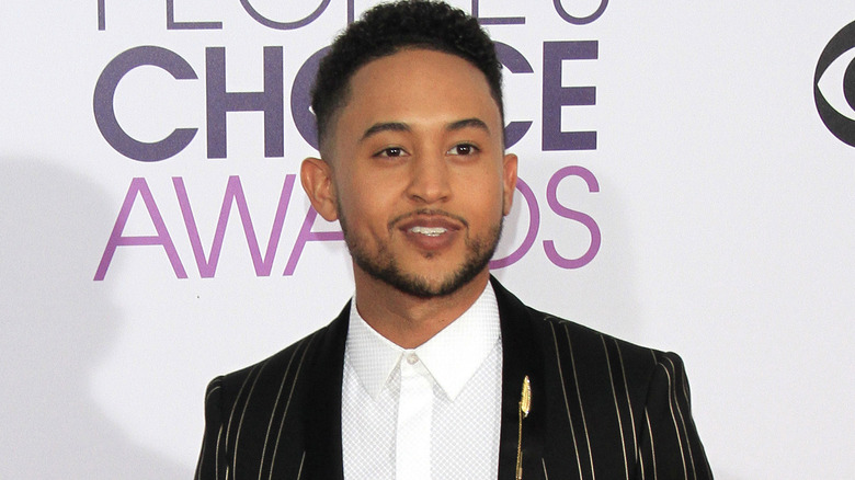 Tahj Mowry posing for cameras