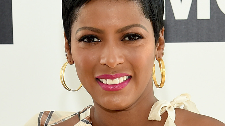 Tamron Hall smiling