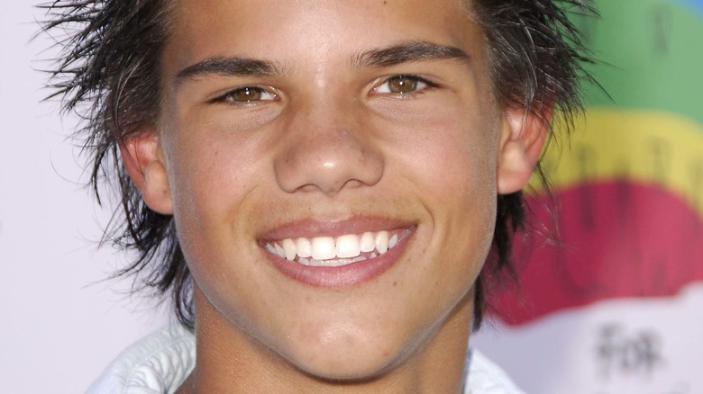 Taylor Lautner smiling as child