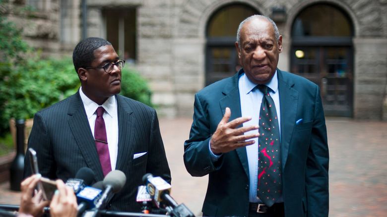 Bill Cosby and his lawyer speaking to the press