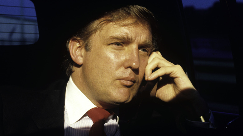 Donald Trump looks pensive in car