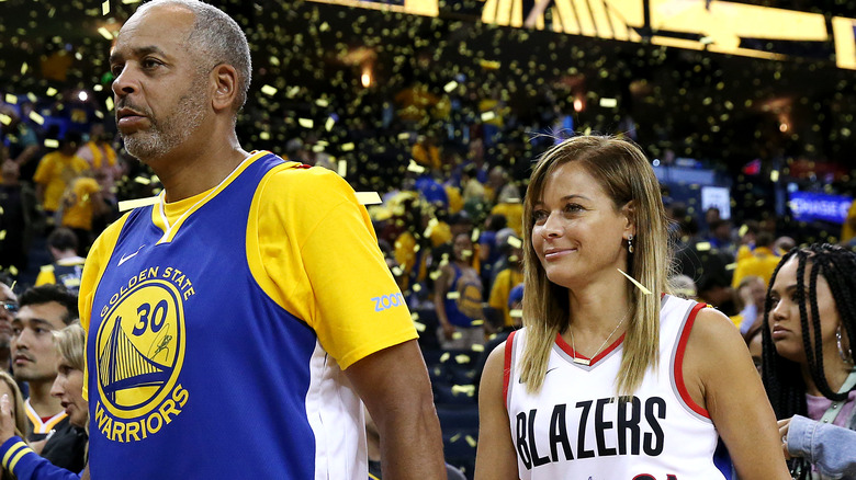 Dell Curry and Sonya Curry at a basketball game
