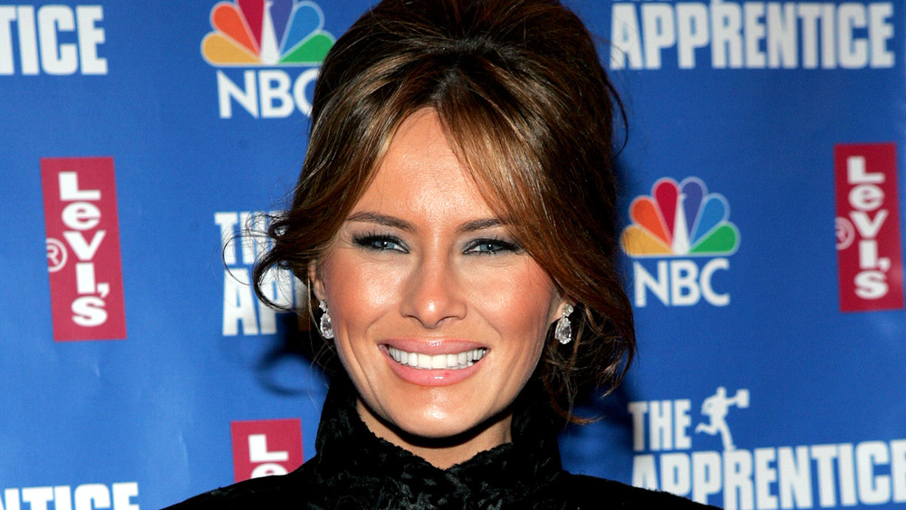 Melania Trump smiling on red carpet