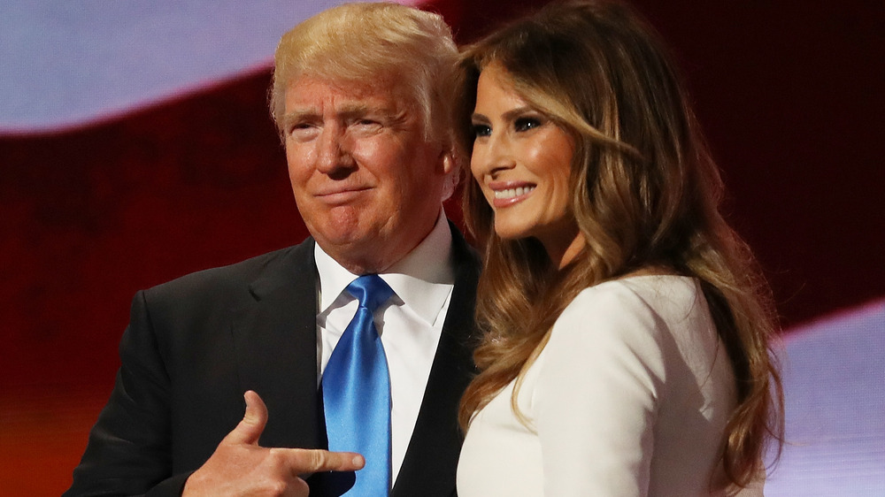 Donald and Melania Trump on stage 