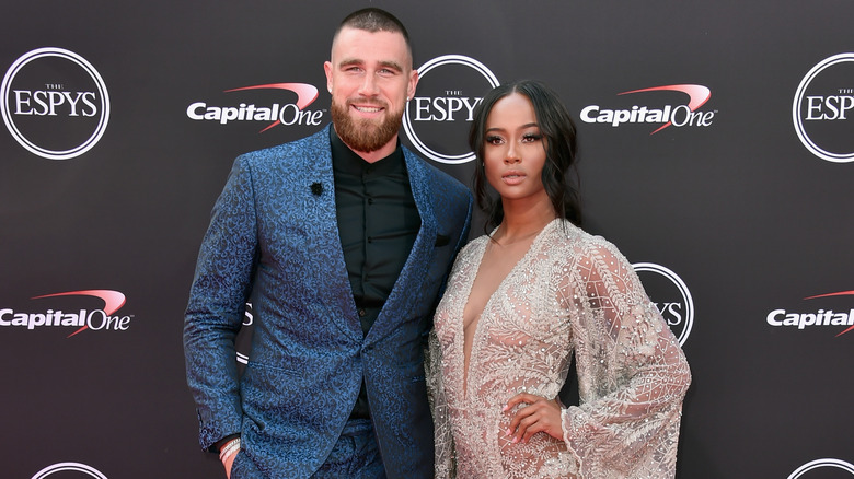 Travis Kelce, Kayla Nicole posing