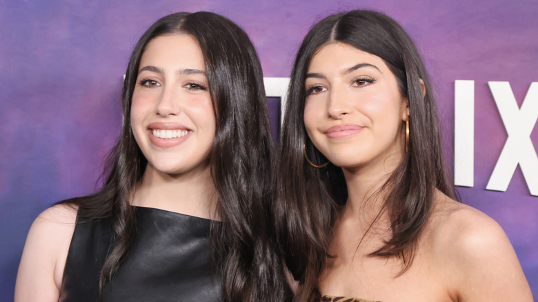 Sunny and Sadie Sandler posing at Netflix premiere red carpet