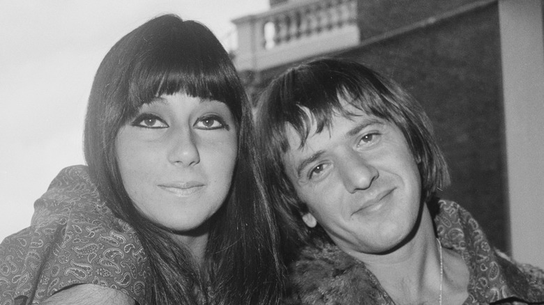 Cher and Sonny Bono, posing