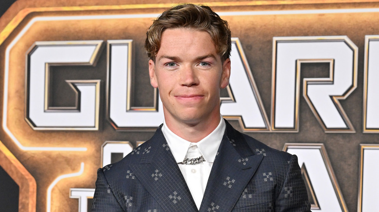 Will Poulter smiling