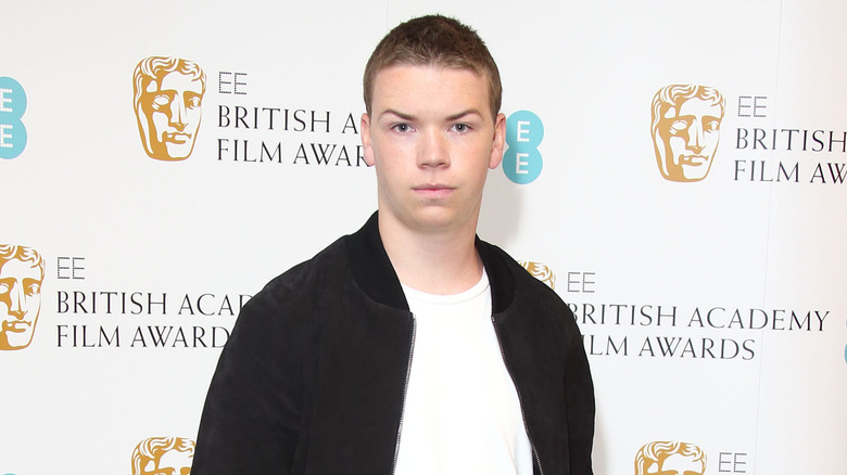 Will Poulter attending BAFTA red carpet