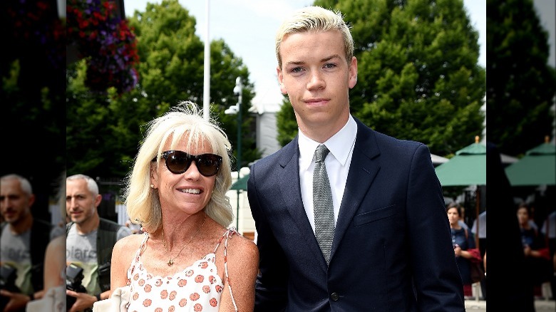 Will Poulter smiling with mom Caroline