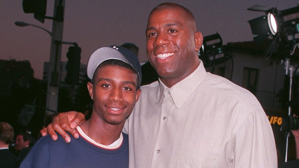 Andre and Magic Johnson arm in arm