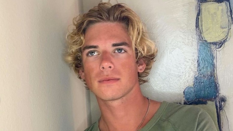 Patrick Huston with curly blond hair