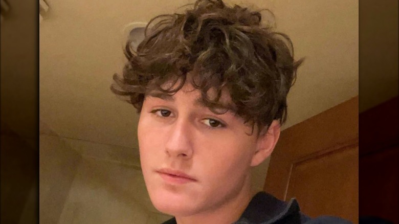 Ryland Storms with dark, curly hair