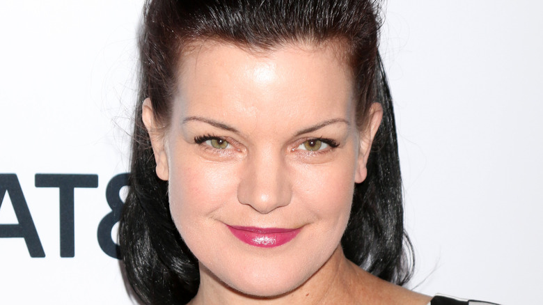 Pauley Perrette smiles on red carpet