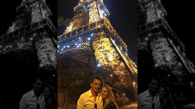 Darin Brooks and Kelly Kruger in front of the Eiffel Tower