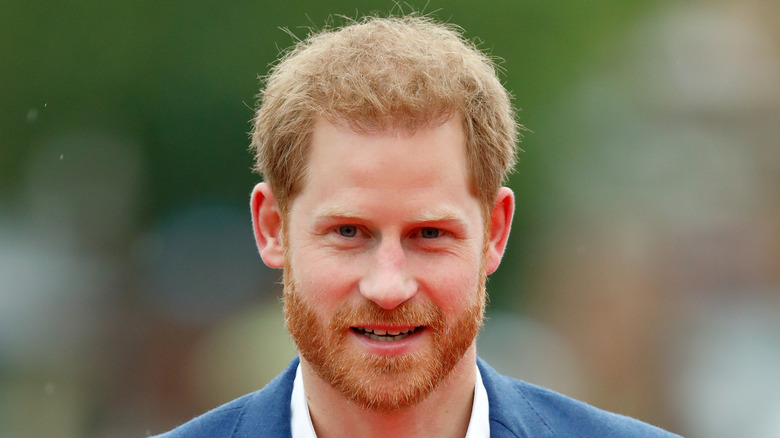 Prince Harry in blue jacket