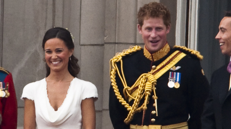 Pippa Middleton and Prince Harry on balcony