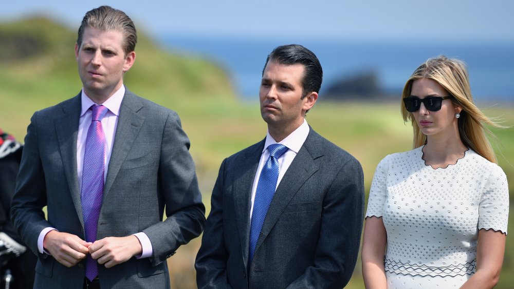 Eric Trump, Donald Trump Jr., and Ivanka Trump at a press conference at Trump's Turnberry Resort in Scotland 