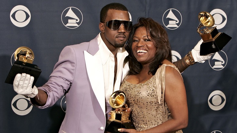 Kanye and Donda West at an event 