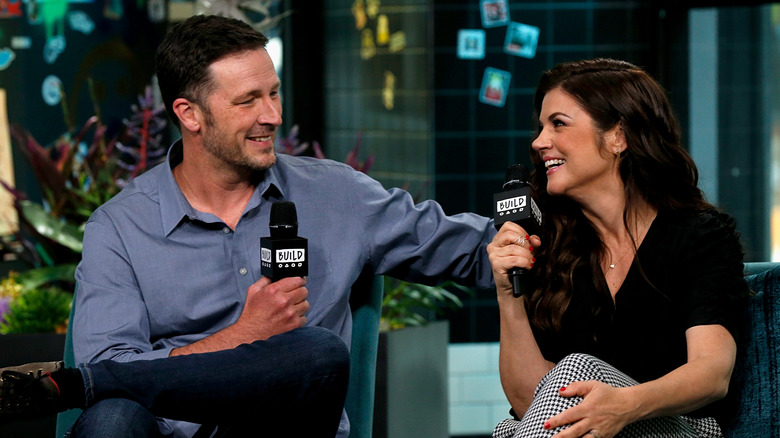 Tiffani Thiessen and Brady Smith smiling