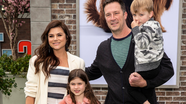 Tiffani Thiessen and Brady Smith with their two young kids